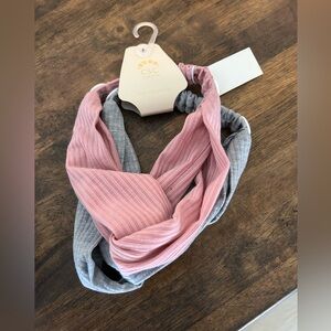 Two pack headbands. Brand new, never worn. One grey, one pink.